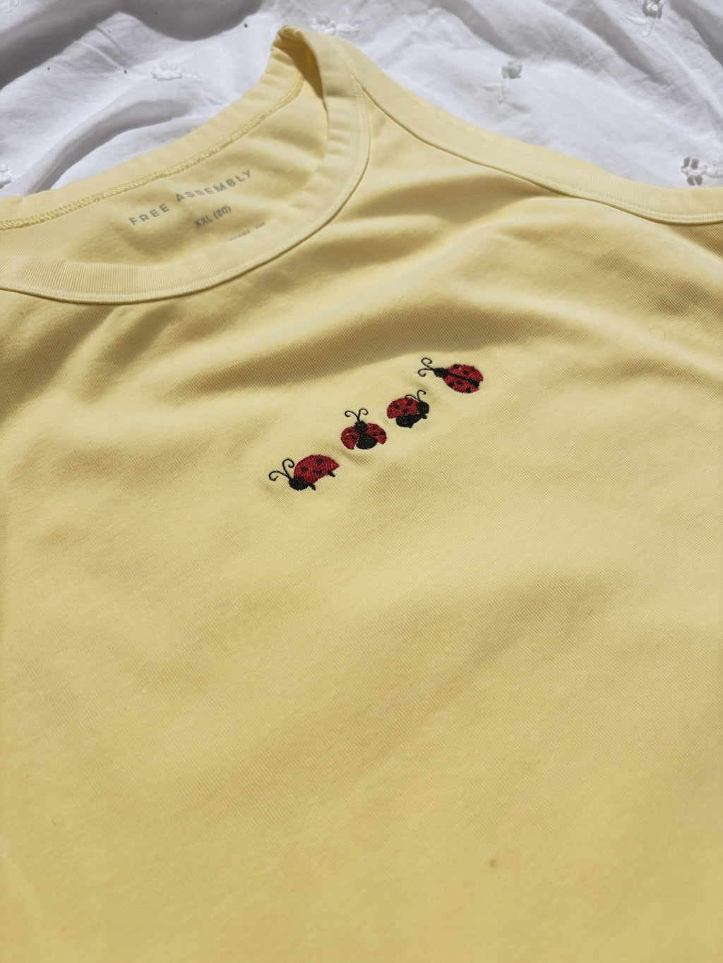 Women's Ladybug Row Embroidered High Neck Tank